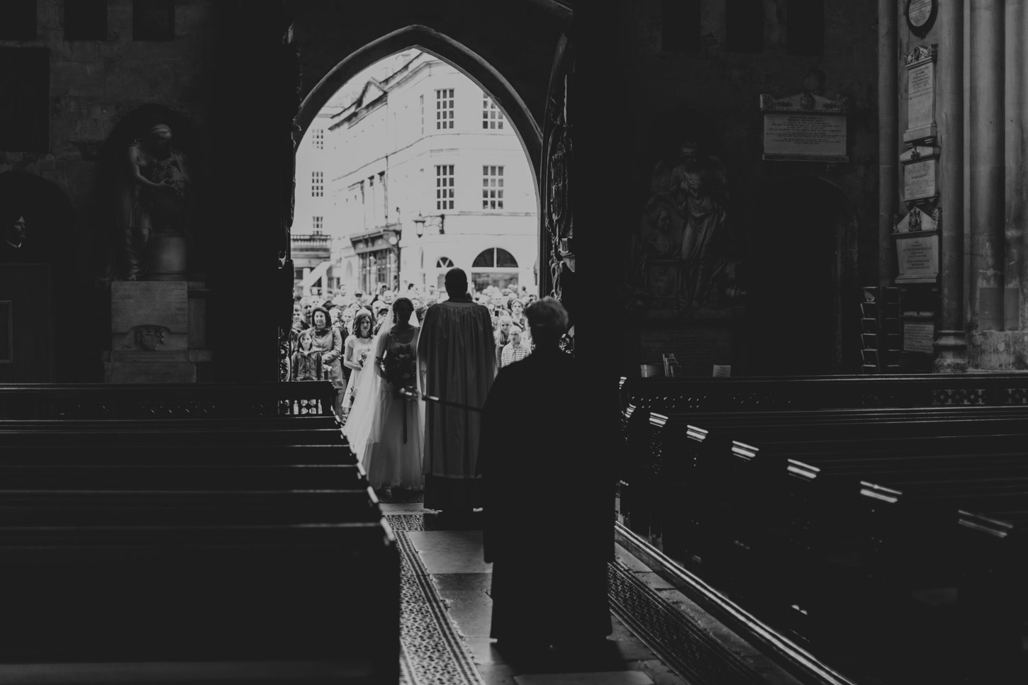 Bride waiting at Bath Abbey Doors on Wedding Day