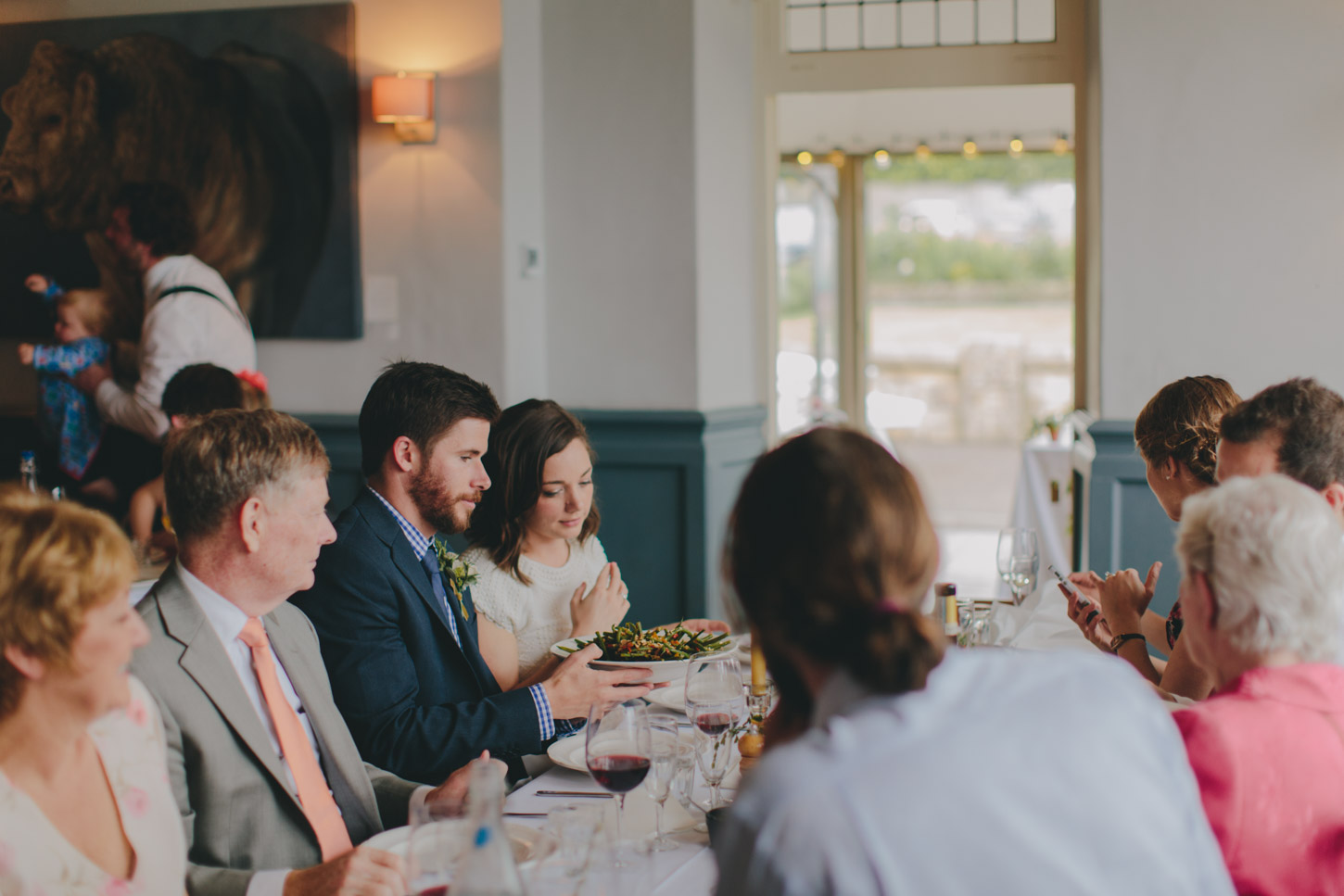 Guests enjoying a sharing dinner at Bath pub Wedding