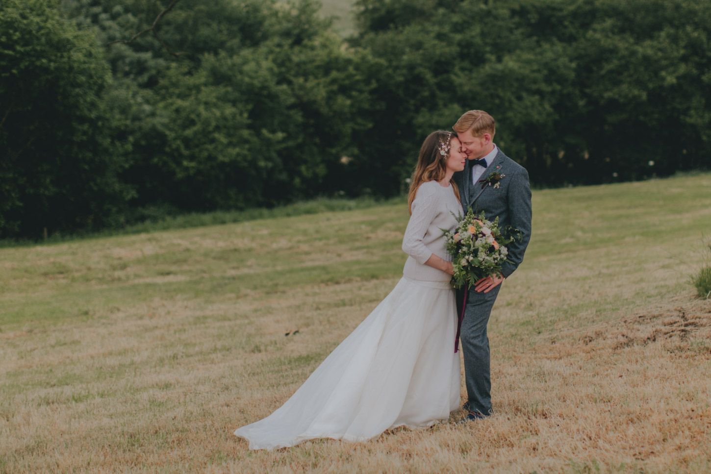 Bride and Groom under giant Oak Tree