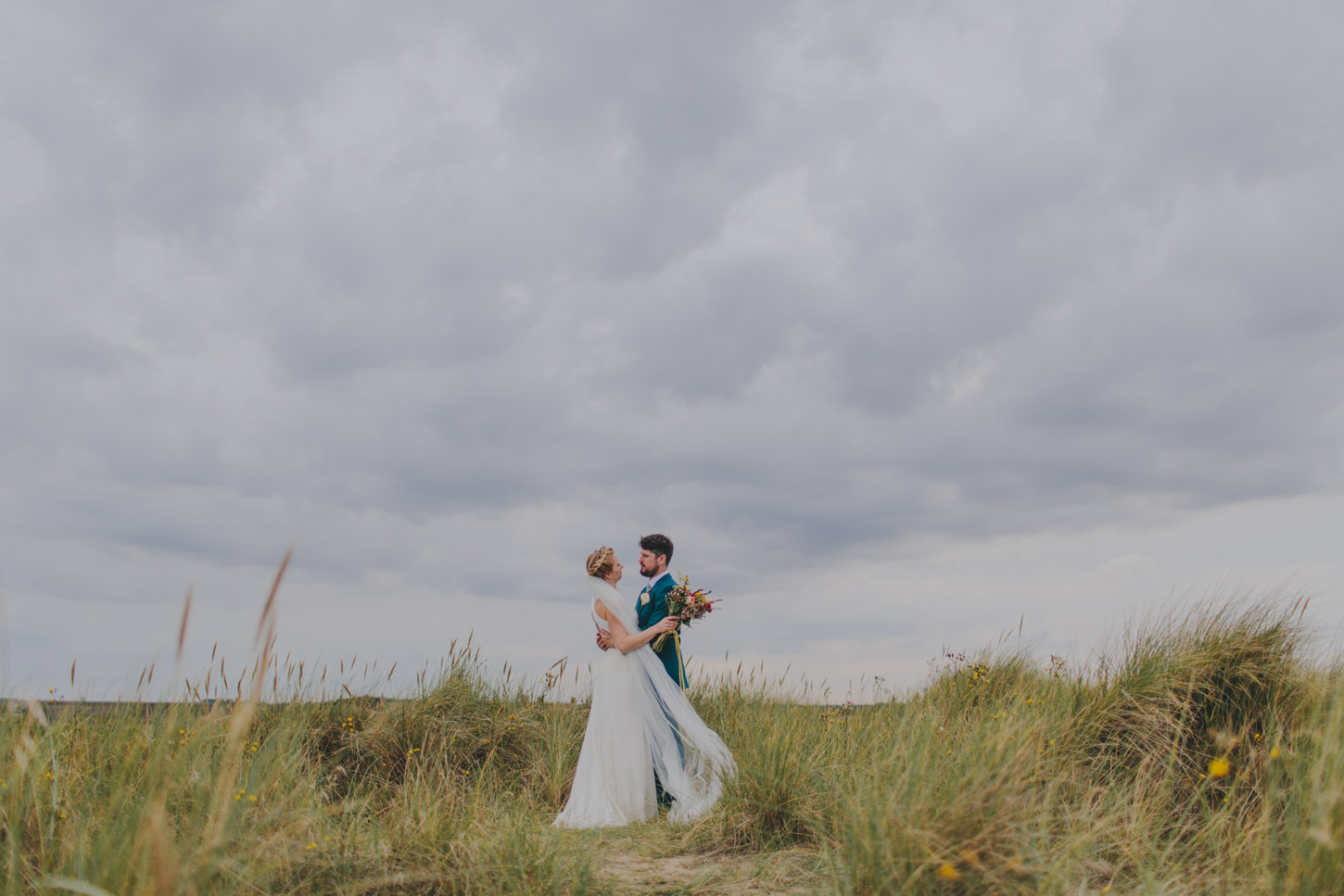 photograph of bride and groom in Norfolk  Dunes