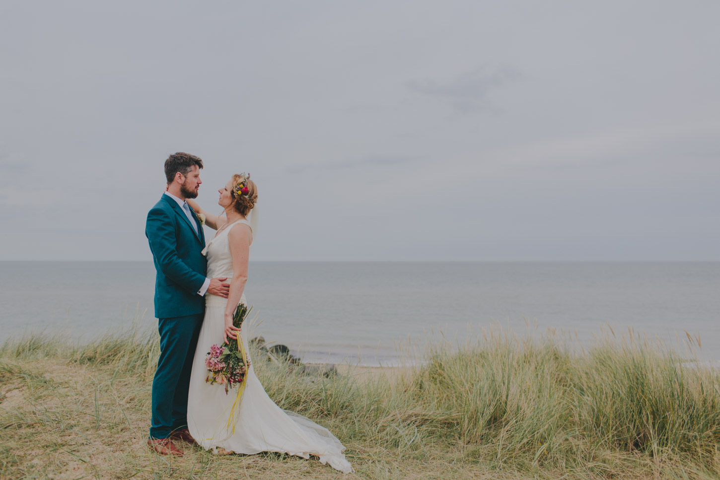 Bride and groom with a sea view
