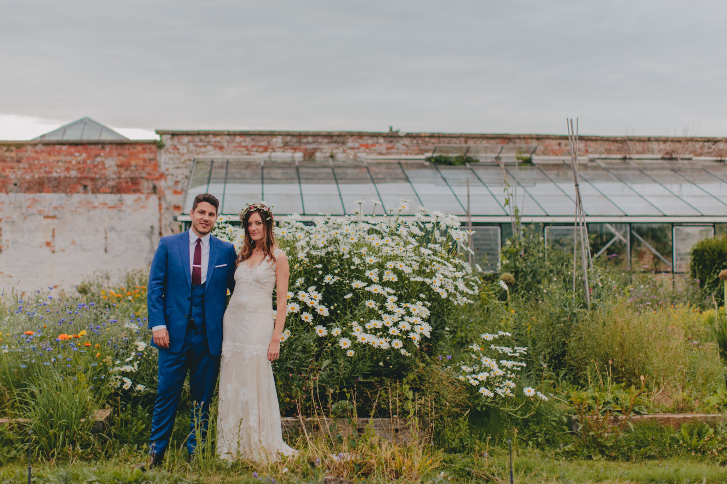 bride nd groom in flower garden